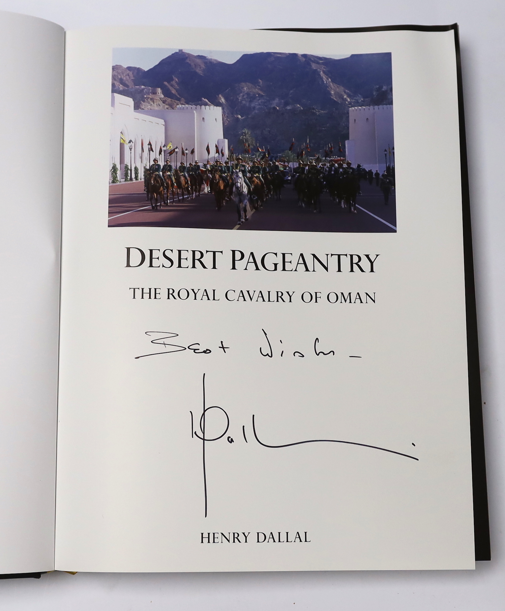 Dallal, Henry - Desert Pageantry: The Royal Cavalry of Oman, signed, folio, black pictorial boards gilt, in d/j, with original box, 2012, Note: Gold medal winner for the most outstanding design of the year, at the Indepe